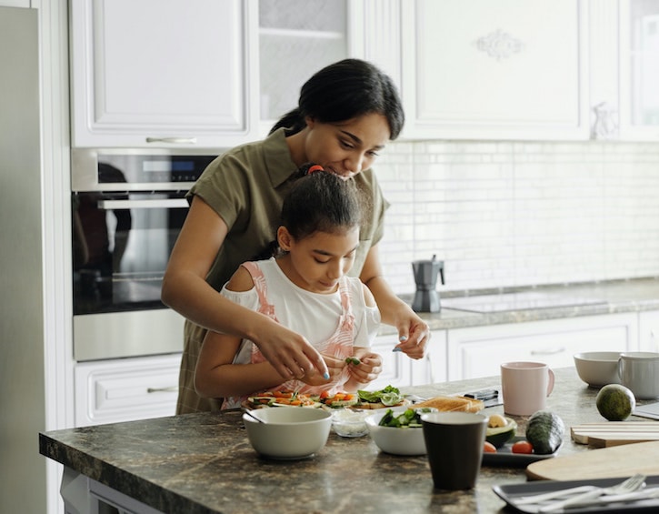 single parenting mother daughter cooking