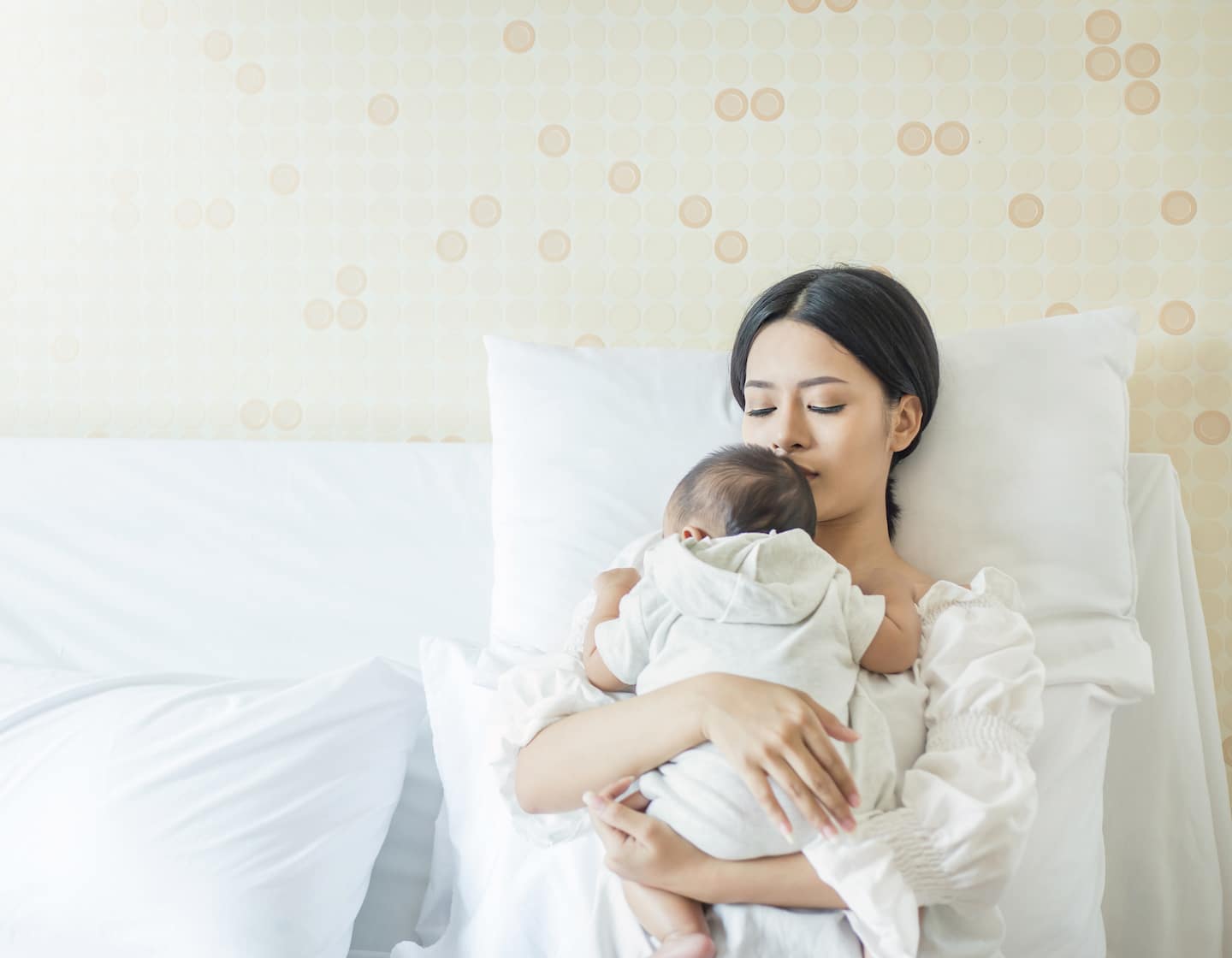 Close up portrait of beautiful young asian mother with newborn baby