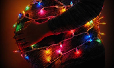 Belly wrapped in lights (horizontal)