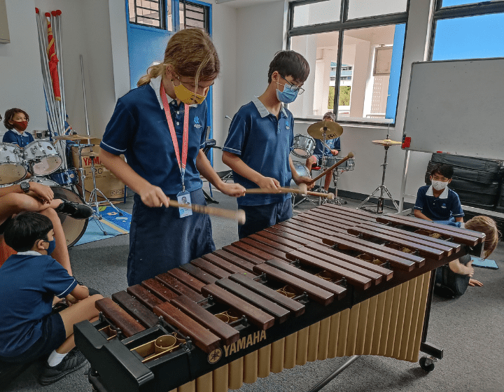 OWIS students in a music lesson