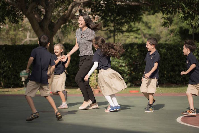 teacher and students at sir manasseh meyer international school singapore