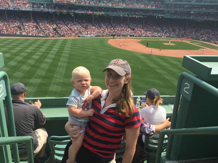 baby at fenway park in boston for a baseball game