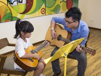 best music schools in singapore aureus academy guitar lesson