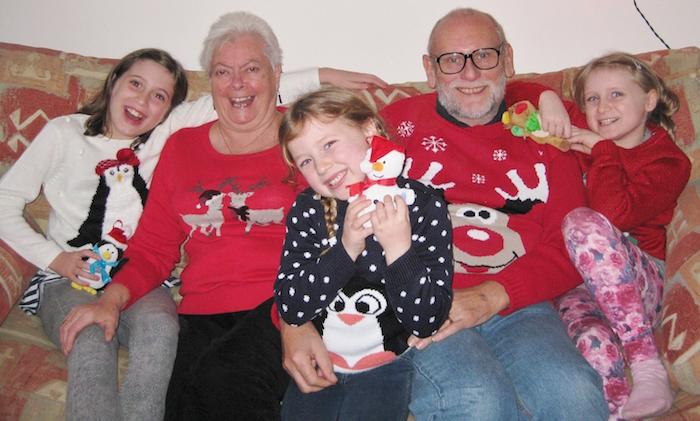 children's author michael read with his grandchildren