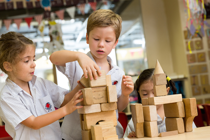 kids playing with block at cis kindergarten