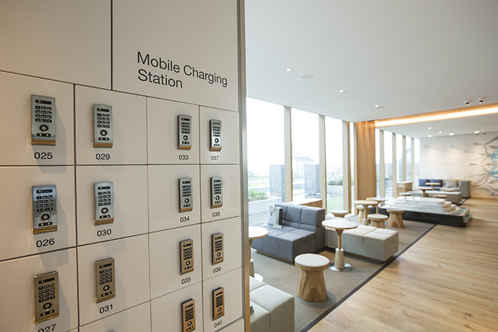 charging area in the lounge at the new pure yoga asia square flagship