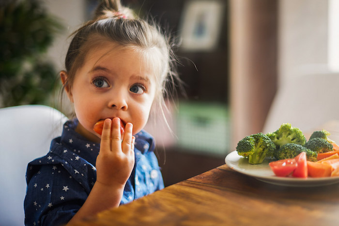 girl-eating-vegetables-healthy