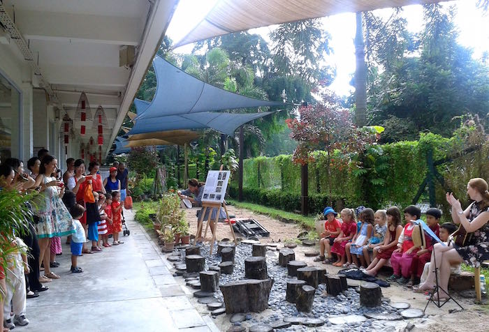 children playing music at blue house nursery and preschool