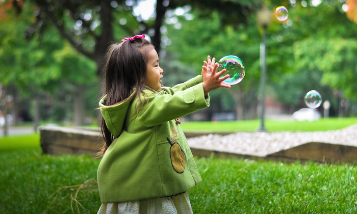 girl-playing-bubbles