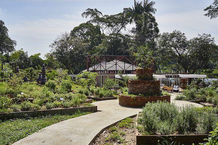 the herb and sculpture garden at open farm community