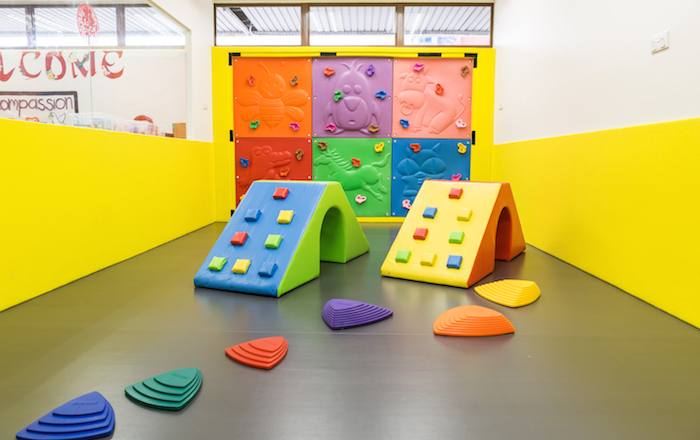 rock climbing at viv's schoolhouse preschool