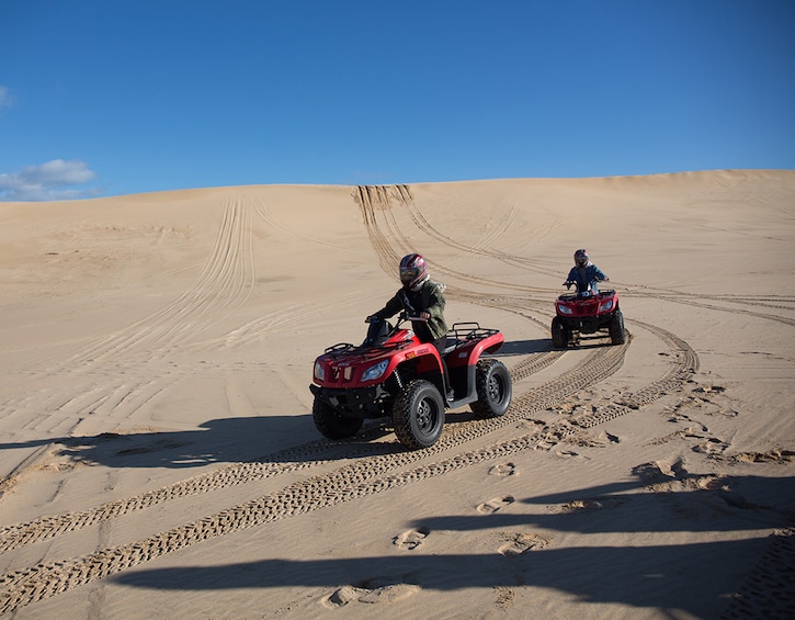 quad biking in the dunes near port stephens