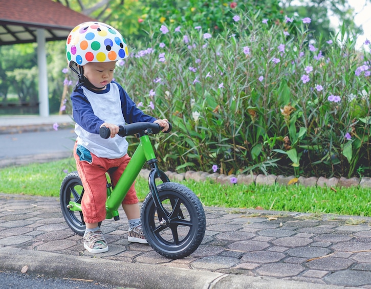 boy learning to ride bike