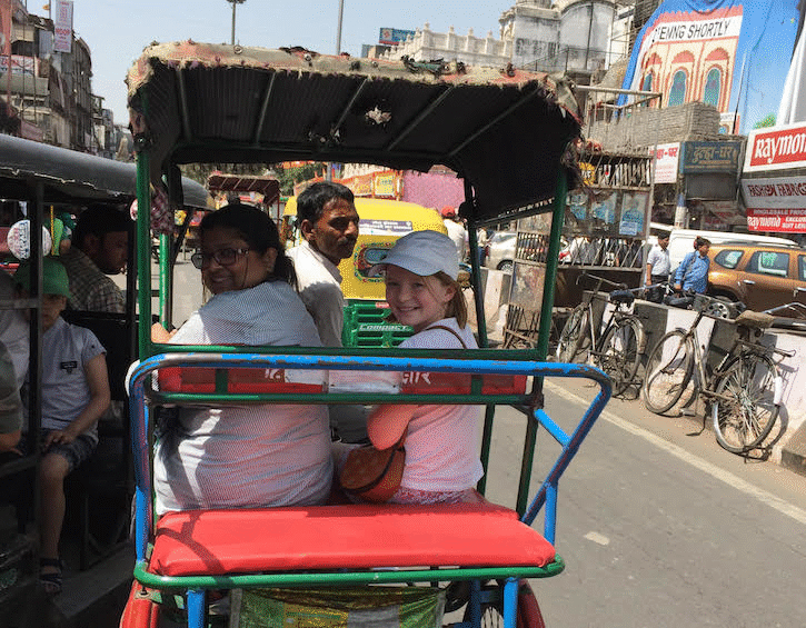 india with kids old delhi bazaar tuktuk