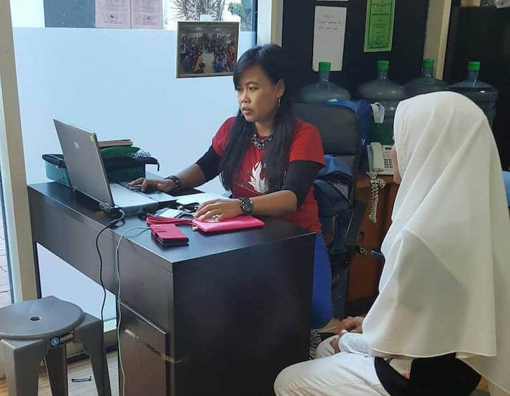 mother's day novia works at the home helpdesk assisting other foreign domestic workers
