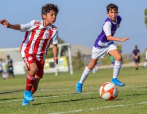 Best Football Clubs in Singapore two boys playing football