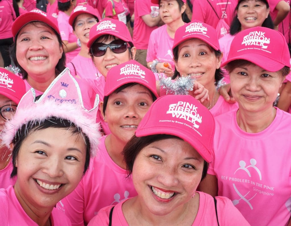 women at the 2018 pink ribbon walk celebrate breast cancer awareness month in singapore