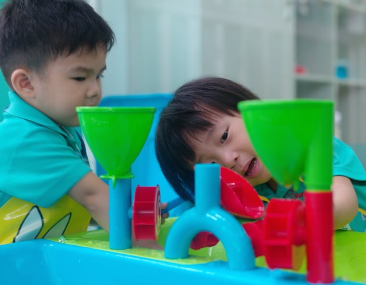 Kids experimenting at Masterminds Montessori which offers kindergarten and enrichment