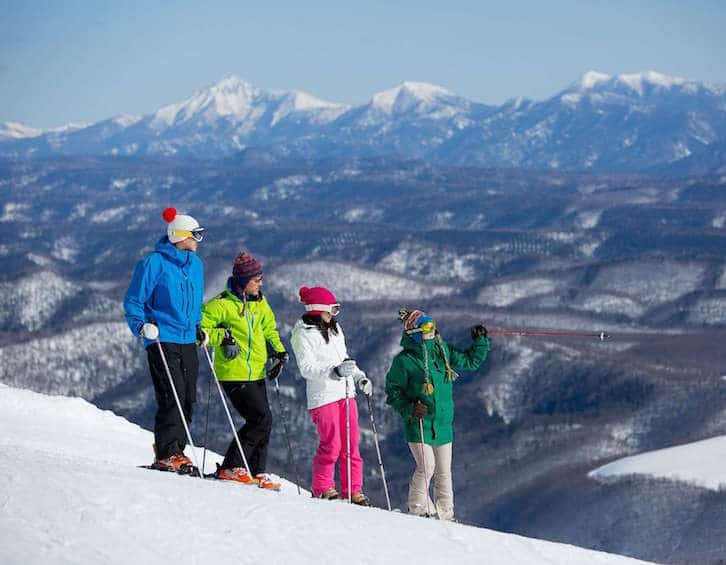 skiers on top of the mountain at club med sahoro