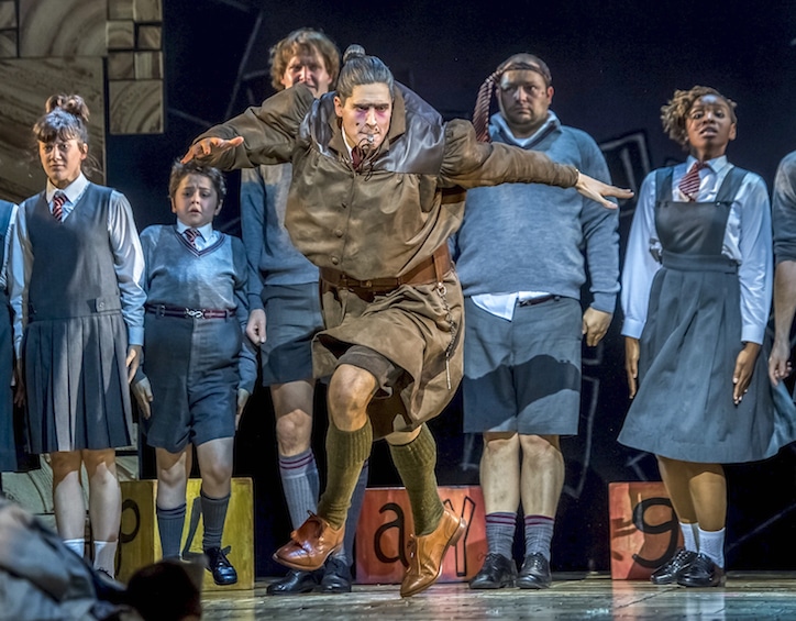 the terrifying miss trunchbull jumps in the schoolyard in matilda the musical