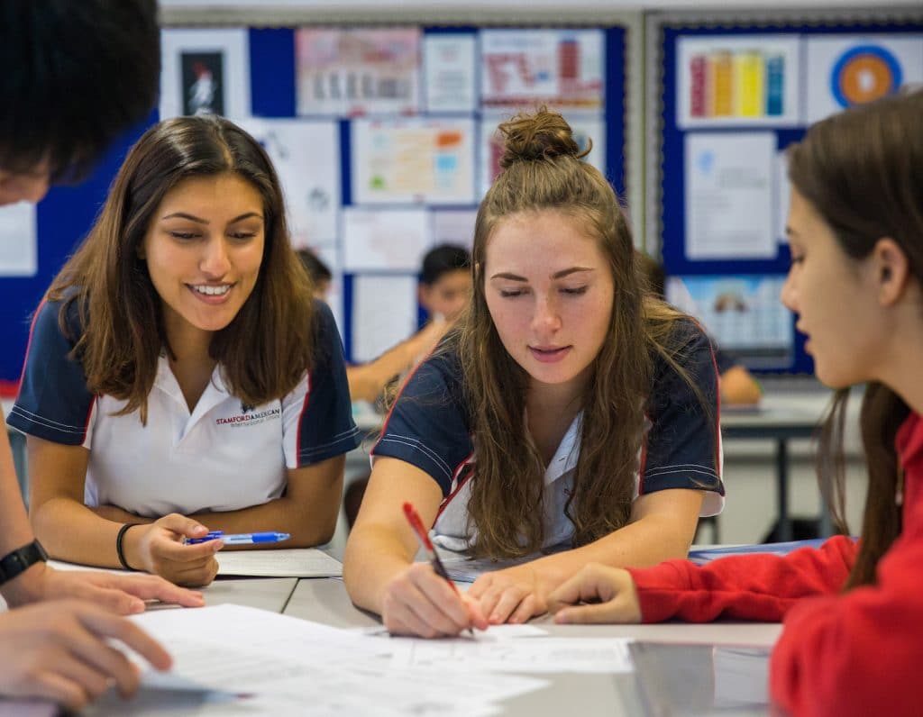 students in a secondary classroom at stamford american international school