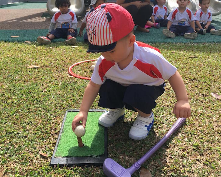 preschool child learning golf at shaws preschool