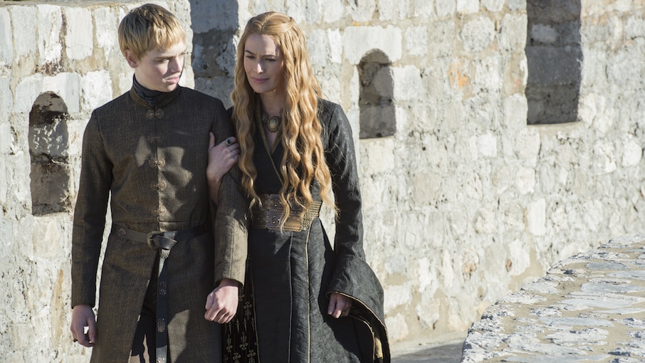 Cersei Lannister walks with her son King Tommen on Game of Thrones