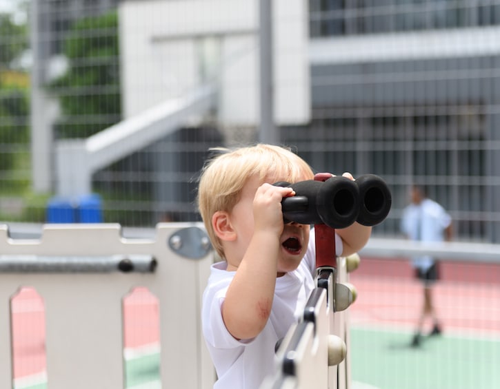 Little GEMS Nursery student plays on the playground at GEMS World Academy (Singapore)