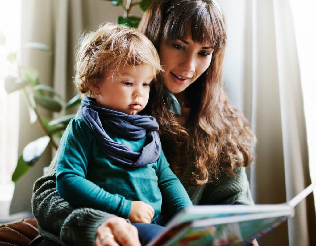 mother child reading book