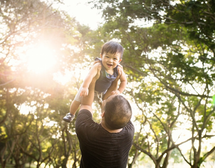 a father and his son during an outdoor family photoshoot in singapore with irina nilsson family photographer
