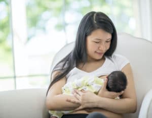 world breastfeeding week singapore nursing mother with baby