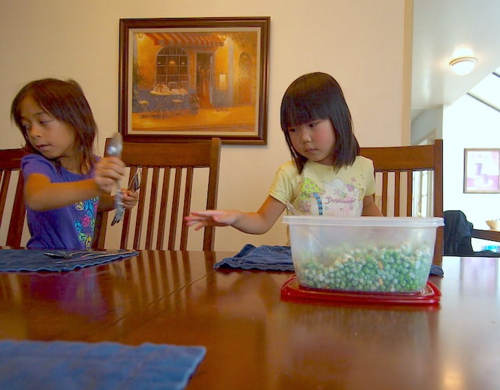 kids setting dinner table independent