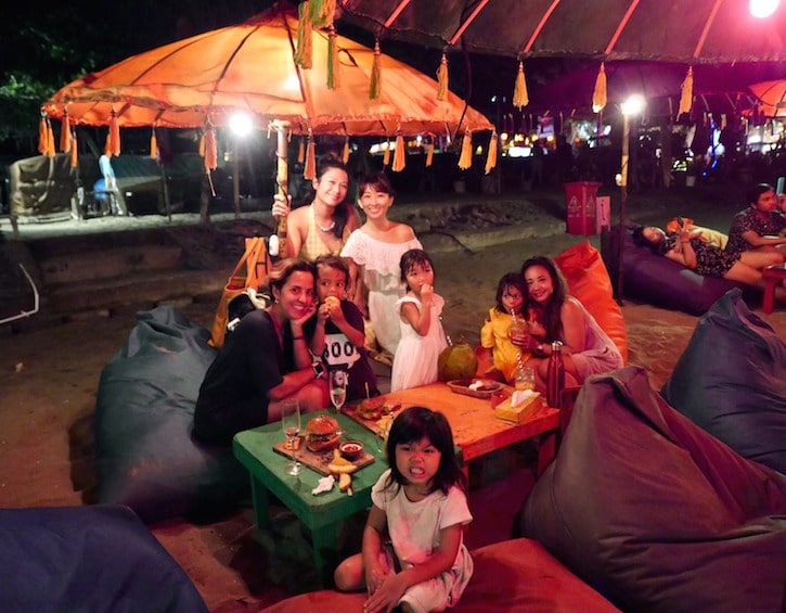 families on seminyak beach during the frontyard family retreat in bali