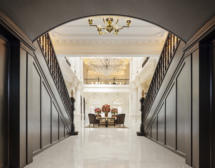 grand staircase at the newly renovated raffles hotel singapore