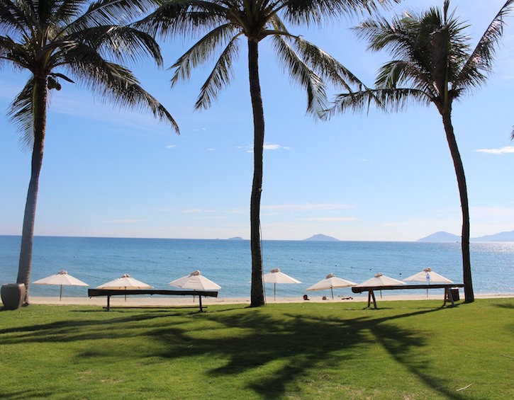 beach and mountains at palm garden resort hoi an vietnam