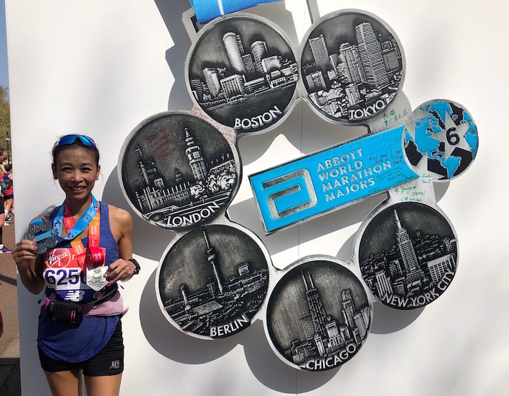 laura koh with her six star major marathon medal