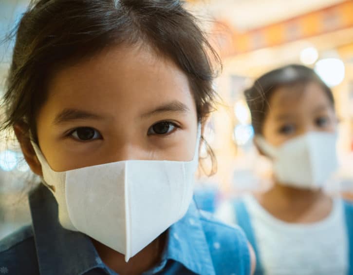 Wuhan virus Singapore kids wearing facemask