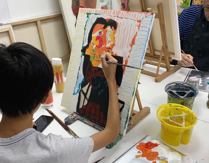 painting at arthouse school holiday camp in singapore