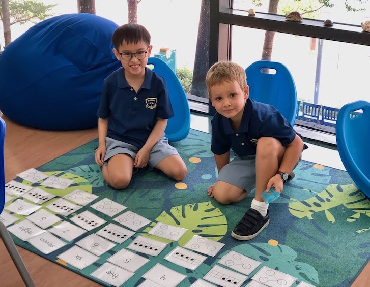 happy students at invictus international school in singapore