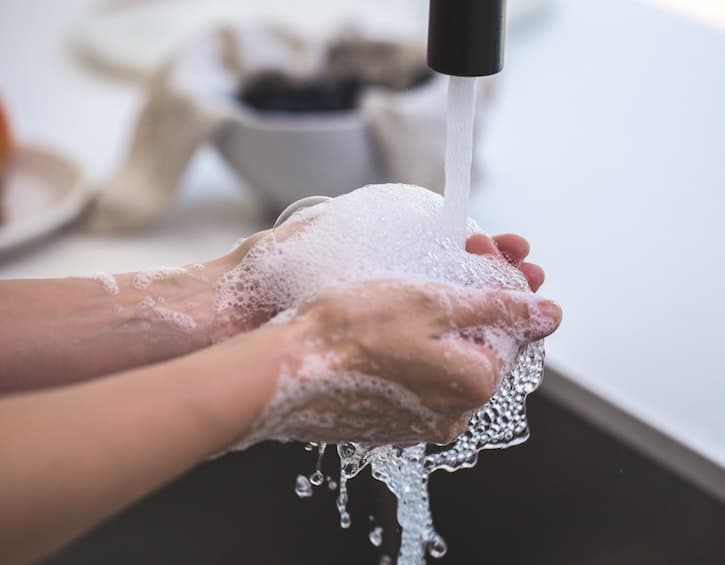 sanitizer vs washing hands 