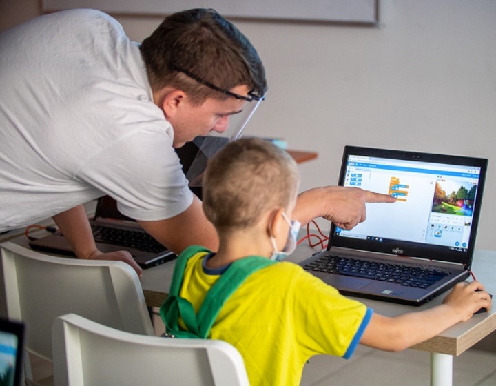 online tuition singapore - Coding Giants classes with teacher and child