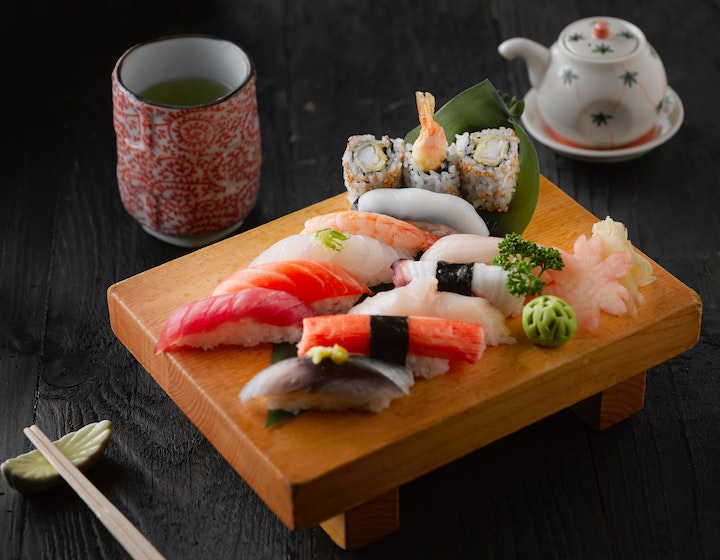 best sushi singapore hero pexels wooden plate of sushi