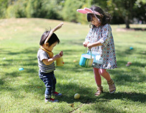 easter egg hunt boy and girl with easter eggs