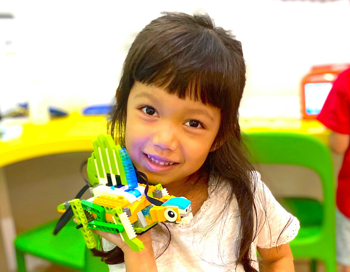 summer camps 2023 singapore children's worklab little girl with her creation