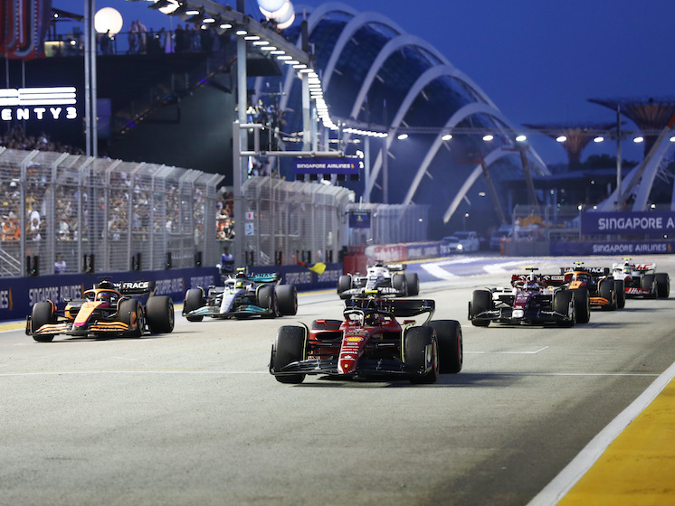 Formula 1 Grand Prix Singapore 2023 cars racing down the pit