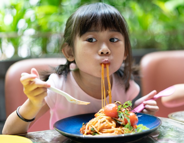 kids eat free deals singapore perch little girl eating spaghetti