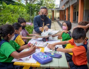 2023 school and public holidays in Singapore students and teacher outdoors