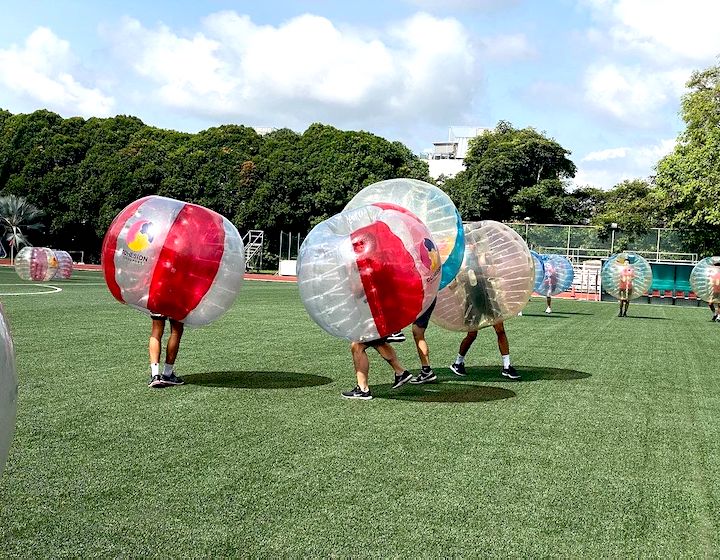 fun team bonding activities in Singapore bubble soccer cohesion sg