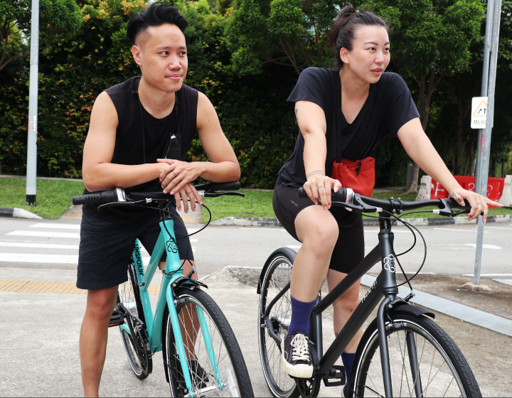 best bicycle shop in singapore unspokin man and woman on bicycles