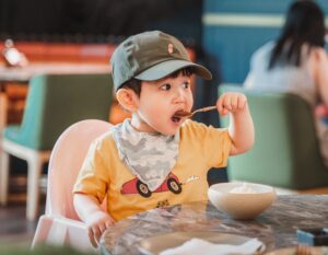 kids eat free deals singapore little boy at perch restaurant